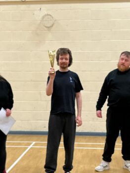 Members of Inspire awarded Ronnie a special trophy